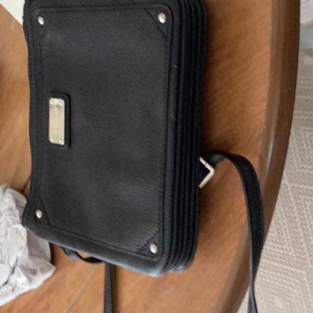 Nine West crossbody bag with 3 compartments, leapord interior, like new